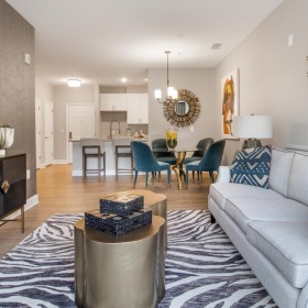 a living room with a couch and a table