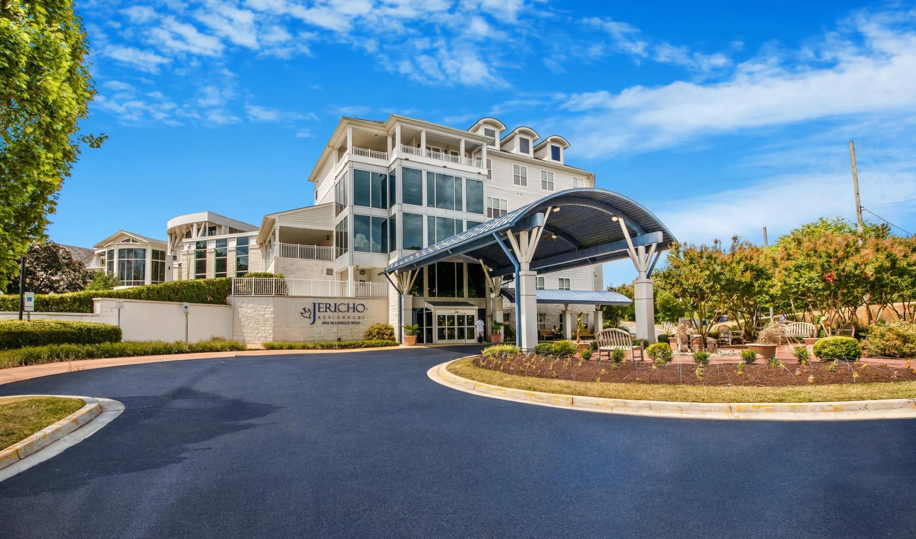 a building with a large driveway